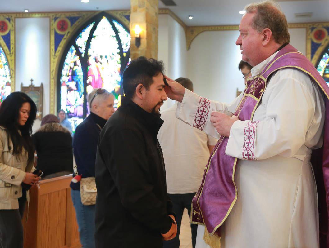 Marking the start of Lent at Immaculate Conception Church in Forest City. 