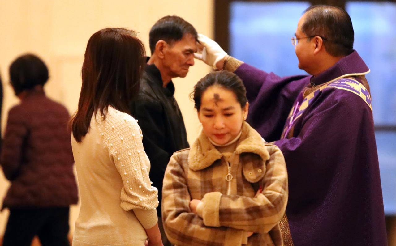 Parishioners at St. Joseph Vietnamese Church in Charlotte celebrate Ash Wednesday with Mass. 