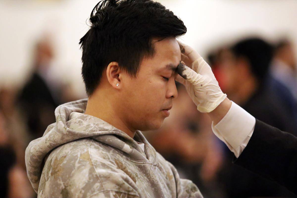 Parishioners at St. Joseph Vietnamese Church in Charlotte celebrate Ash Wednesday with Mass. 