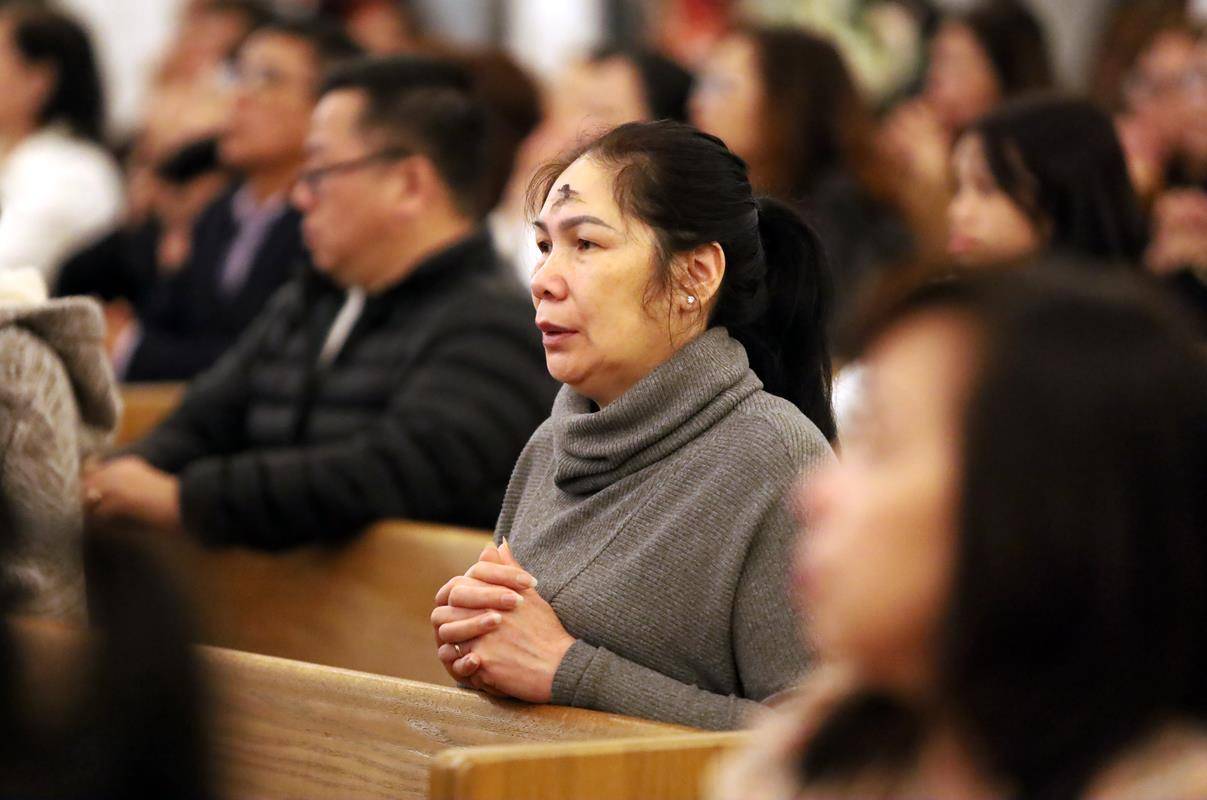 Parishioners at St. Joseph Vietnamese Church in Charlotte celebrate Ash Wednesday with Mass. 
