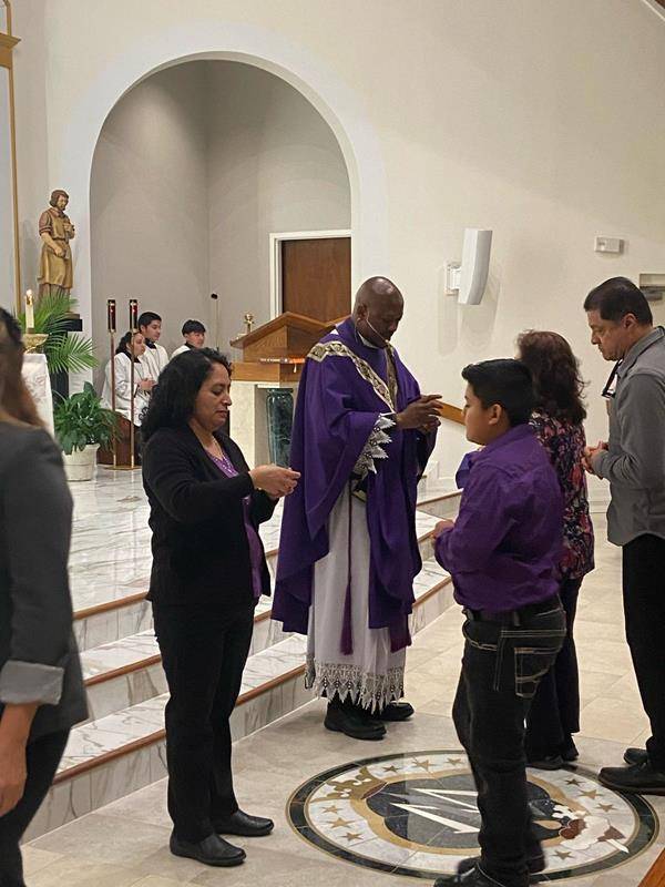 Parishioners at St. Phillip Apostle in Statesville mark the start of Lent. 