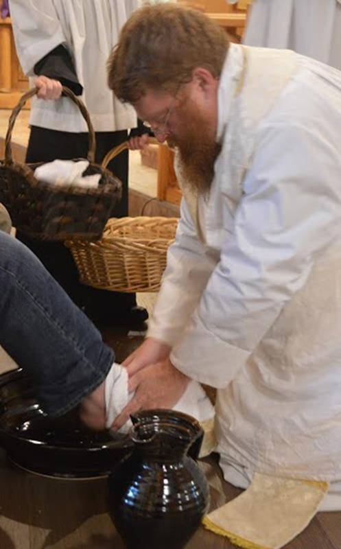 SYLVA —Holy Thursday Mass and Reposition of the Eucharist at St. Mary's Catholic Church in Sylva with Father Joshua Voitus. (By Della Sue Bryson) 