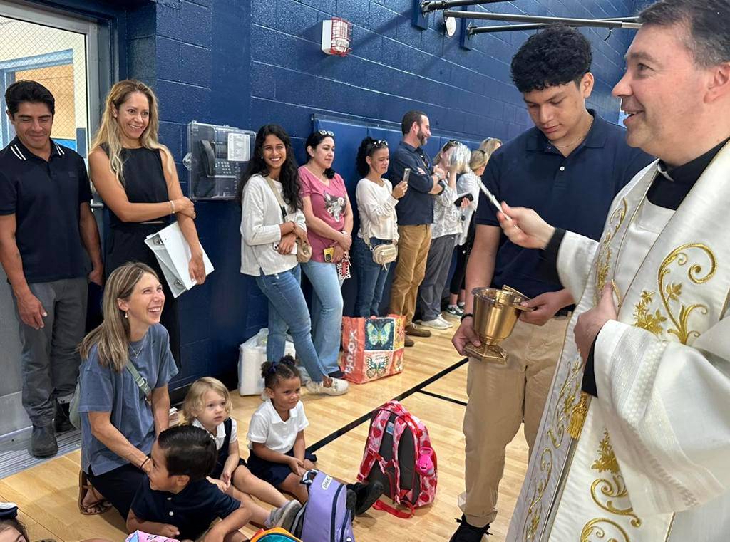 A blessing of the backpacks by Father Andres and greetings from Principal Margaret Beale began the first day of school at Immaculata Catholic School Aug. 18. 