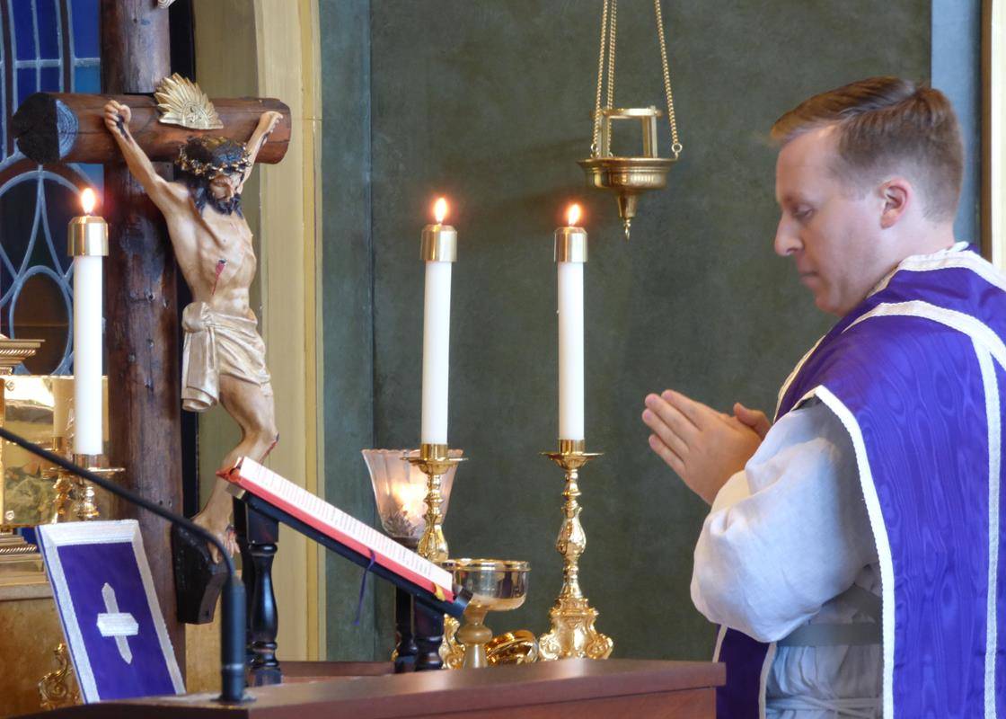 The Triduum concludes with the Saturday Easter Vigil at 8pm at Charlotte Catholic High School.  (By Mike FitzGerald) 