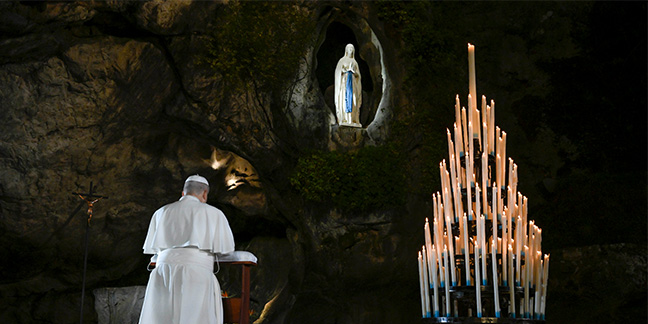 Pope Leo prays for the sick and suffering in the Lourdes grotto in France